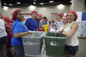 At the 2013 LCMS Youth Gathering, participants packed 323,000 meals on the floor of the convention center.