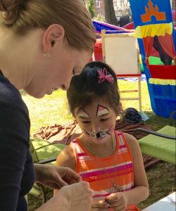 Activities for children included face painting, Bible stories, and crafts.
