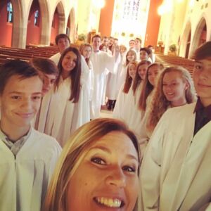 DCE Jayme Nichols takes a selfie with confirmands at Concordia Lutheran Church in Kirkwood, MO before the Rite of Confirmation on October 30, 2016.