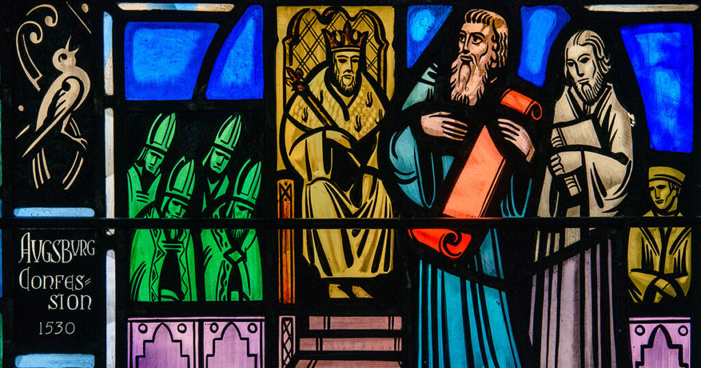 A stained glass window at Luther Memorial Chapel in Shorewood, Wis., depicts the presentation of the Augsburg Confession on June 25, 1530. (LCMS Communications/Erik M. Lunsford)