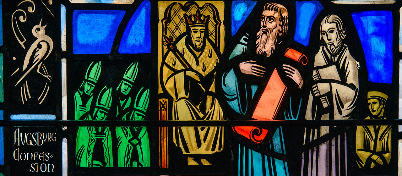 A stained glass window at Luther Memorial Chapel in Shorewood, Wis., depicts the presentation of the Augsburg Confession on June 25, 1530. (LCMS Communications/Erik M. Lunsford)